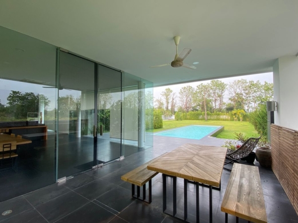 A modern home with pool for sale or rent at Green Vally Golf Course