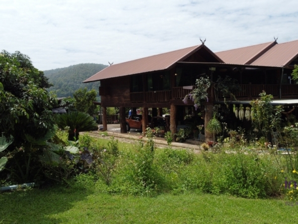 Countryside living. Riverfront 4 Bedroom teak house on a farm surrounded by beautiful mountain view. Chiang Dao