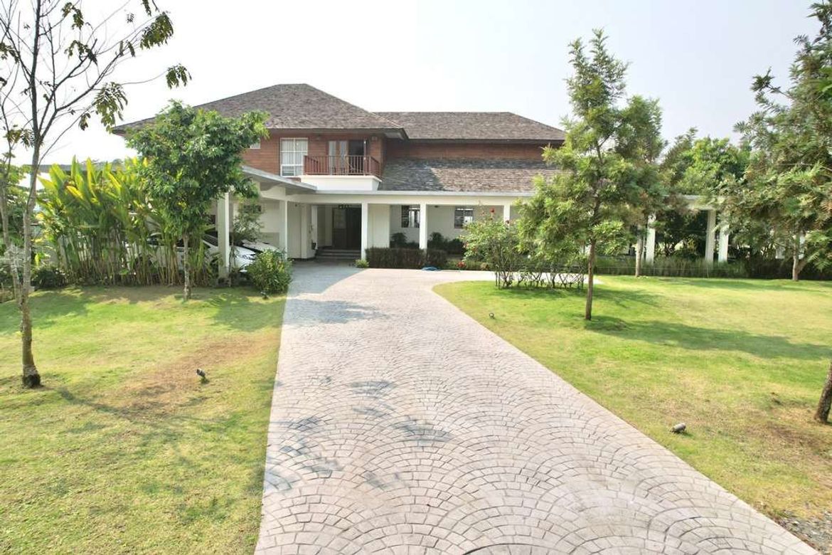 A large house on 14 rai of land for sale