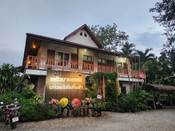 A large fishing park with restaurant for sale in Saraphi