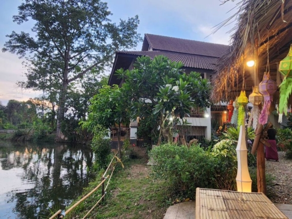 A large fishing park with restaurant for sale in Saraphi