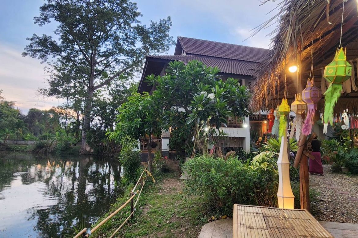 A large fishing park with restaurant for sale in Saraphi