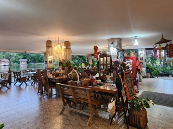 A large fishing park with restaurant for sale in Saraphi