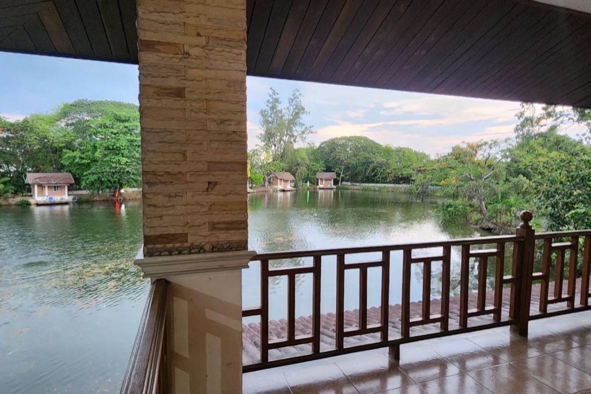 A large fishing park with restaurant for sale in Saraphi