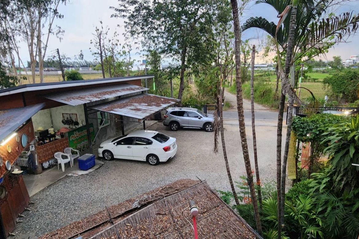 A large fishing park with restaurant for sale in Saraphi
