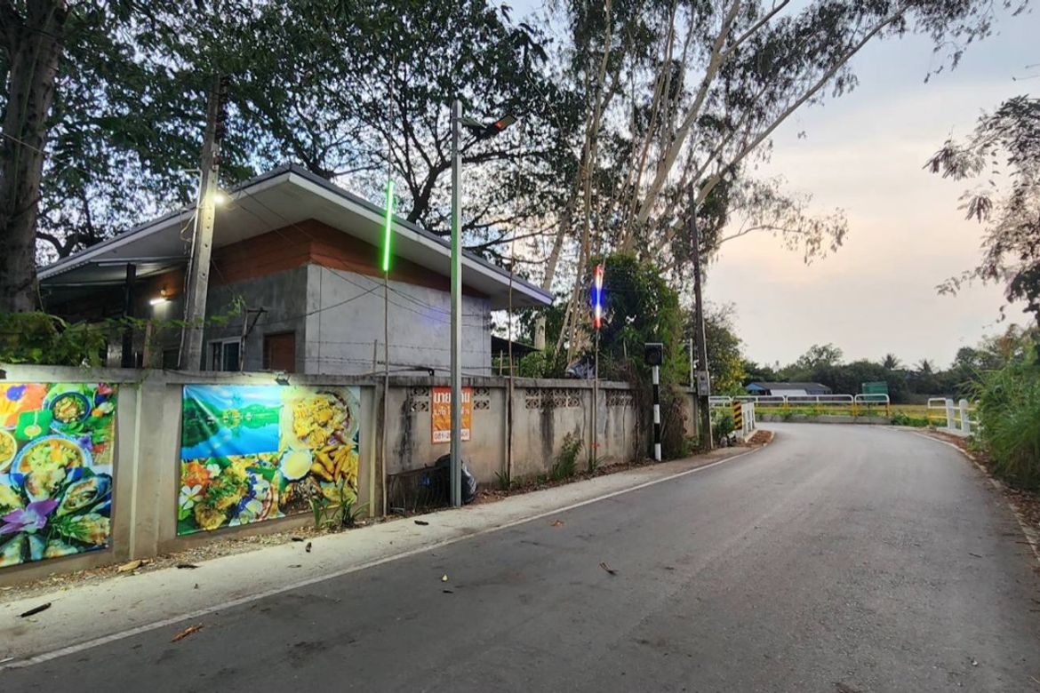A large fishing park with restaurant for sale in Saraphi