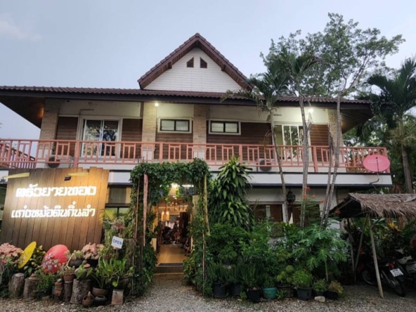 A large fishing park with restaurant for sale in Saraphi