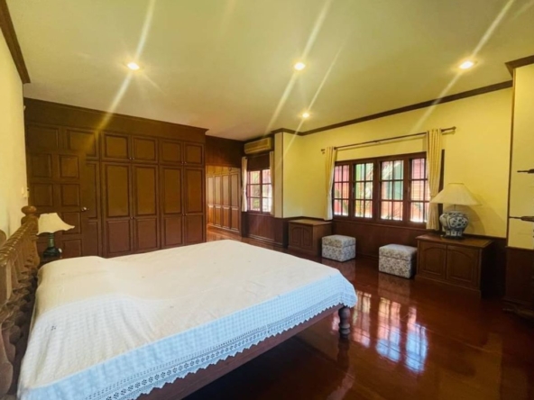 Applied Thai style house for sale. Built with golden teak behind the house next to the lake In a quality project