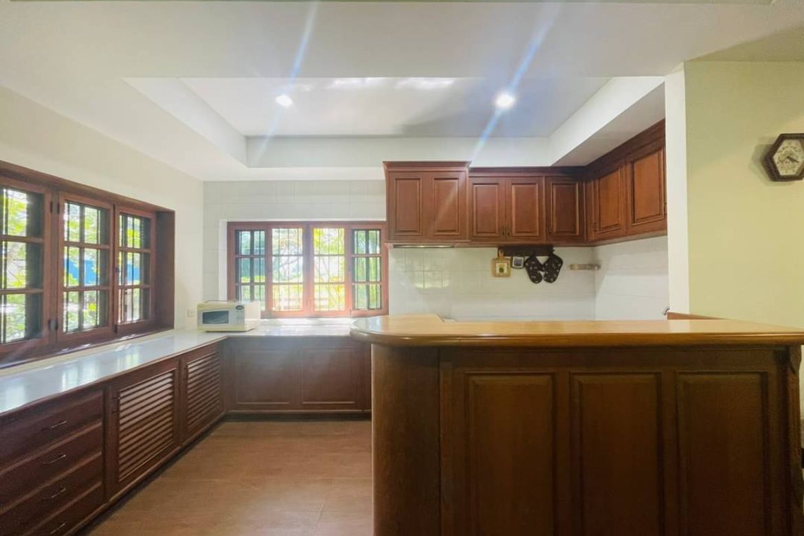 Applied Thai style house for sale. Built with golden teak behind the house next to the lake In a quality project