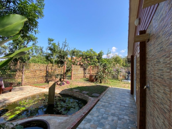 A beautiful teak wooden house for sale in Mae Taeng