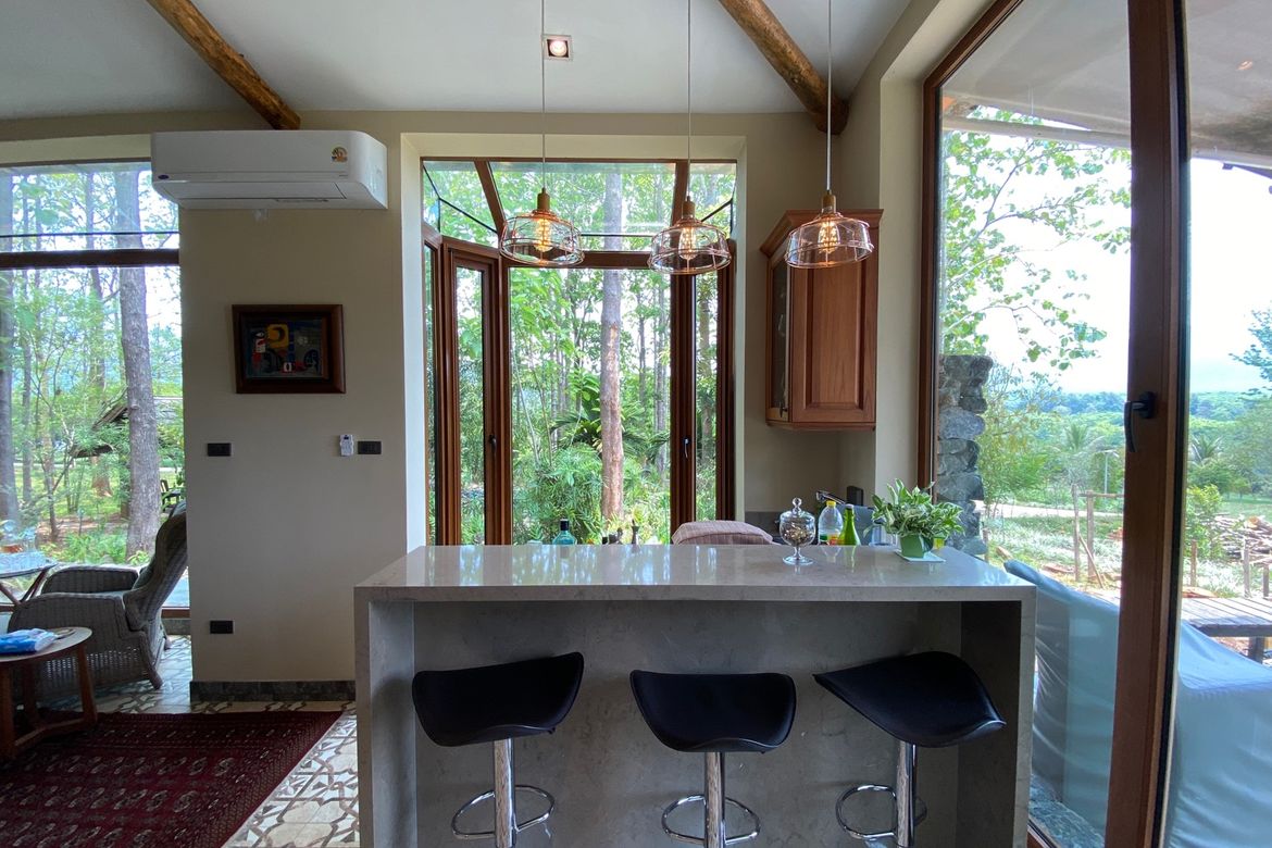 A 12 rai teakwood estate with luxury residence is for sale in Phrao area of Chiang Mai-P-PHS1127